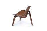 The SHELL Chair - A glamorous sculptural wood lounge chair with mid-century curves by Ali Khan Studio