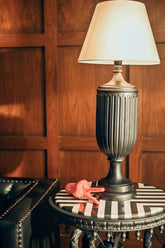 NIGHT TALK Lamp - A glamorous black fluted table lamp styled on a striped console by Ali Khan Studio