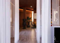 Modern Luxury Bedroom-Lounge with Sculptural Seating & Warm Wood Walls