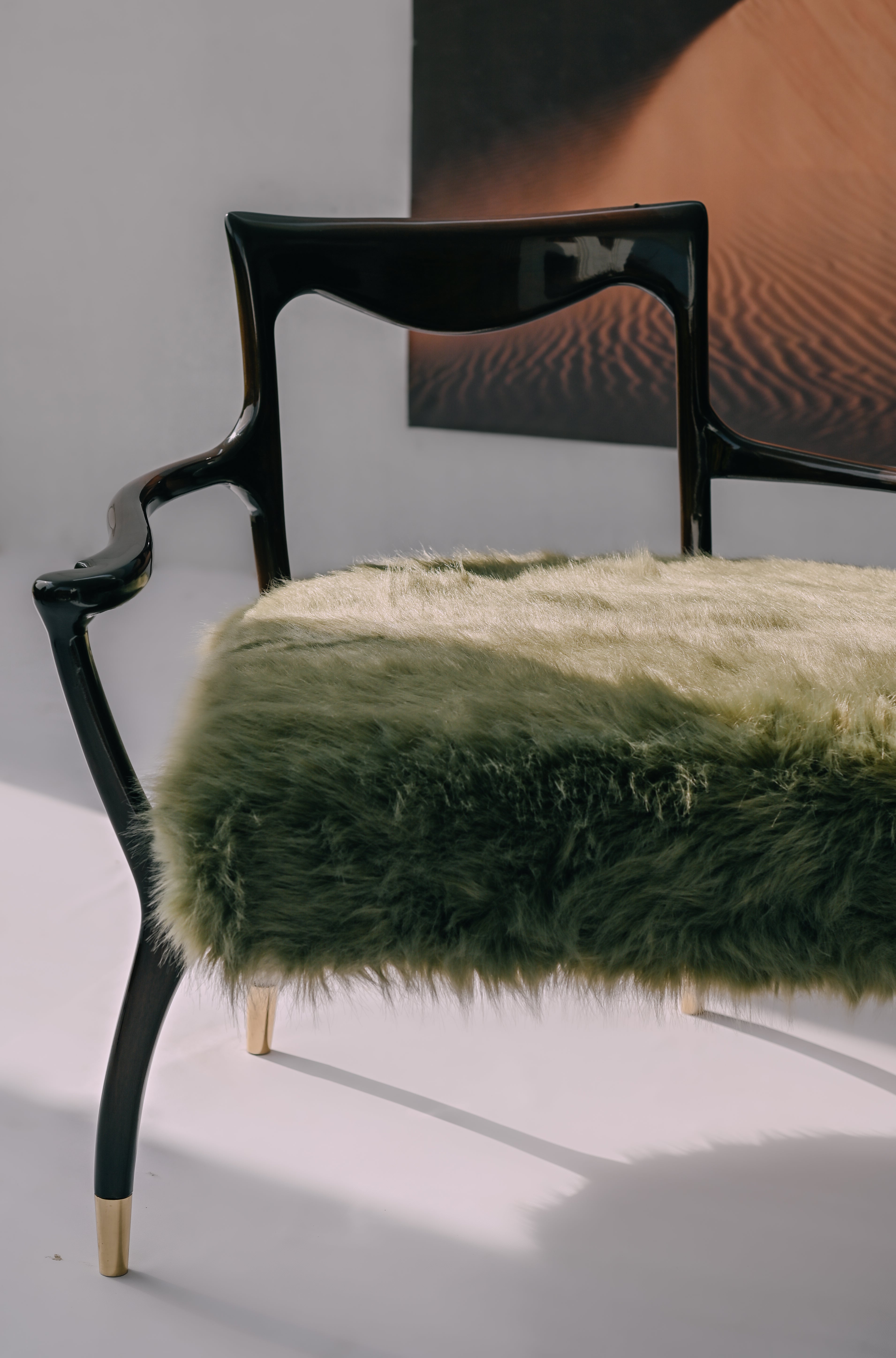 Rear view of the ARCHED BACK Bench showing fluid organic curves and skeletal wooden frame