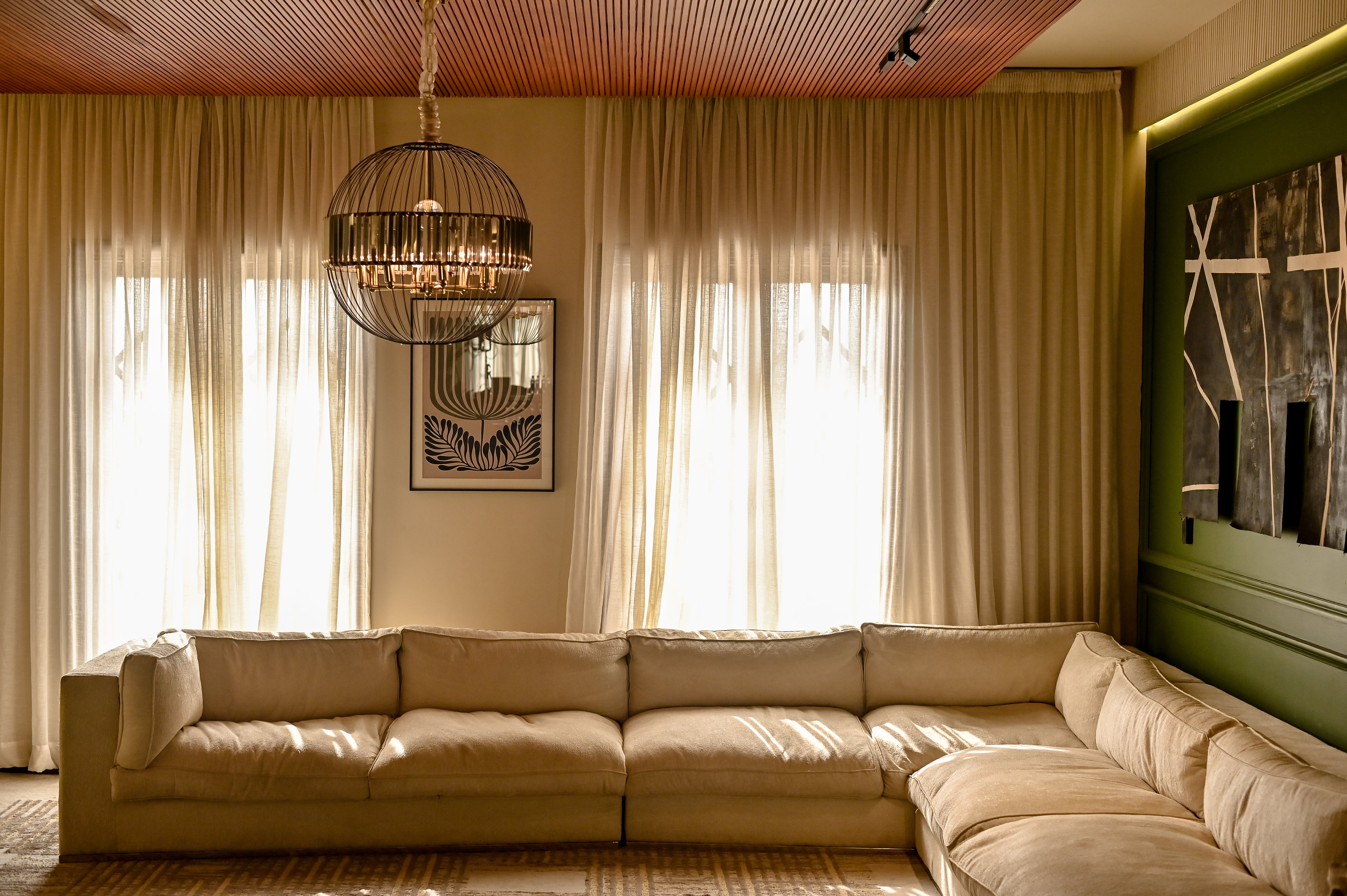 Cloud L-Shape Down-Feather Sofa in a cinematic sanctuary interior by Ali Khan Studio Karachi Pakistan