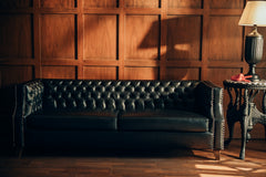 Full view deep button tufting and classic rolled arms on the NOIR Chesterfield Sofa
