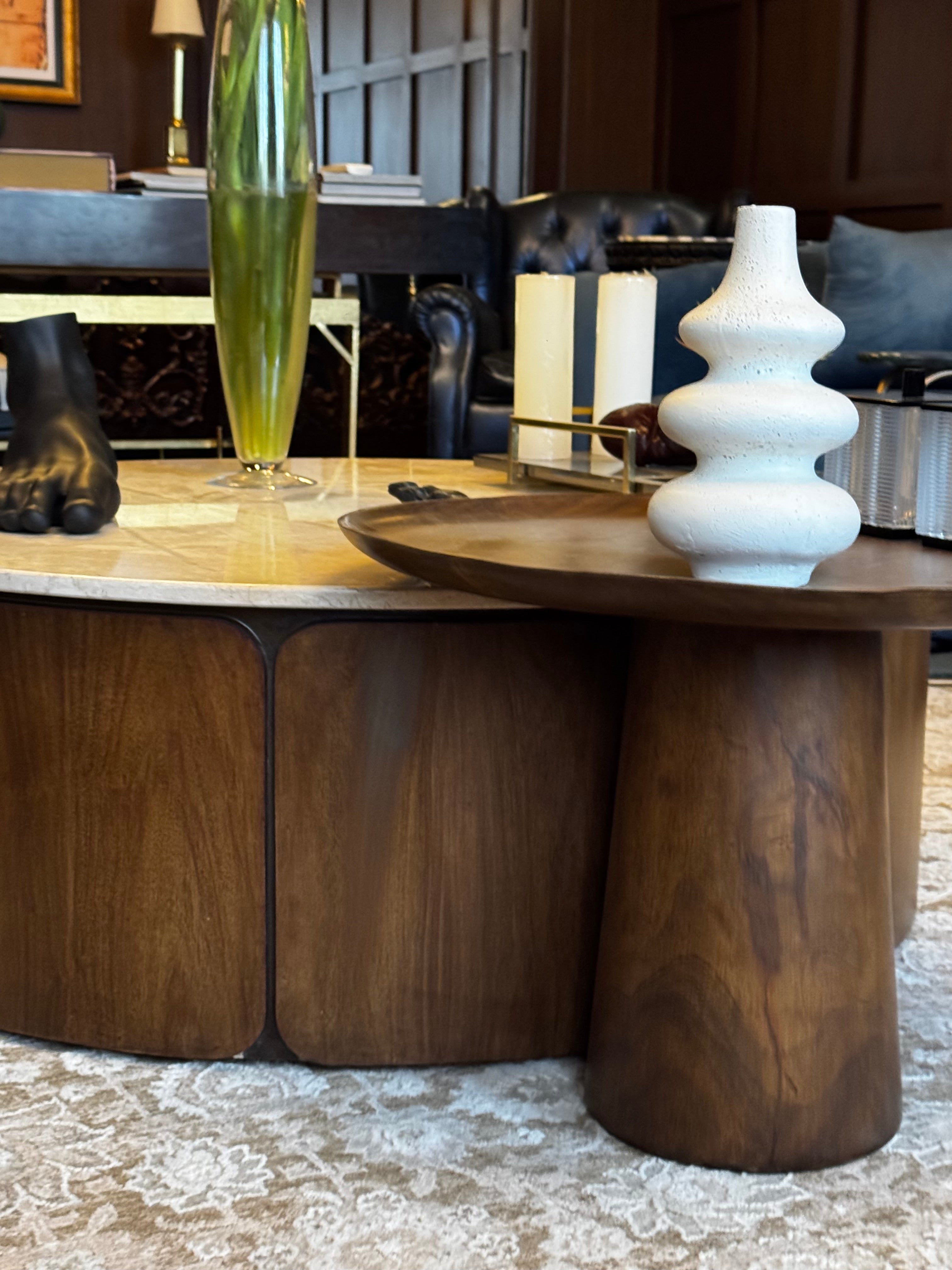 TECTONIC Coffee Table styled in a cinematic luxury living room with sculptural decor and dramatic lighting